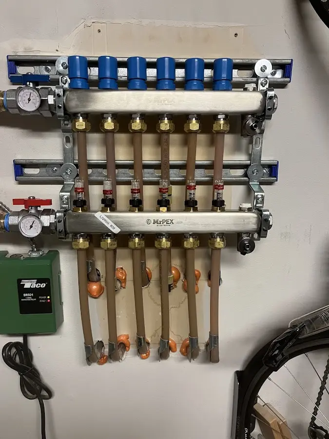 Plumber performing Leak Detection at a residential property in North Canaan